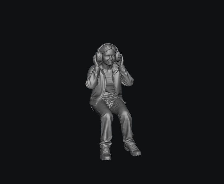 WOSC007 - Race Day Spectator - Woman With Earmuffs Seated