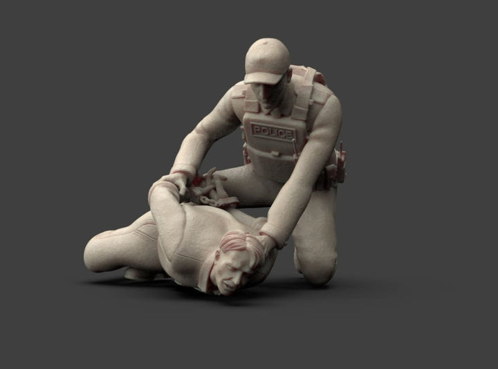 MM1223 Policeman Arresting Suspect Figure
