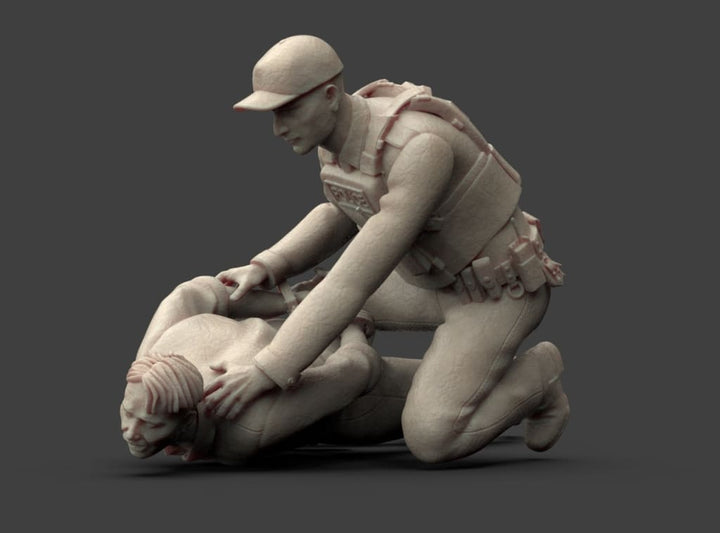MM1223 Policeman Arresting Suspect Figure
