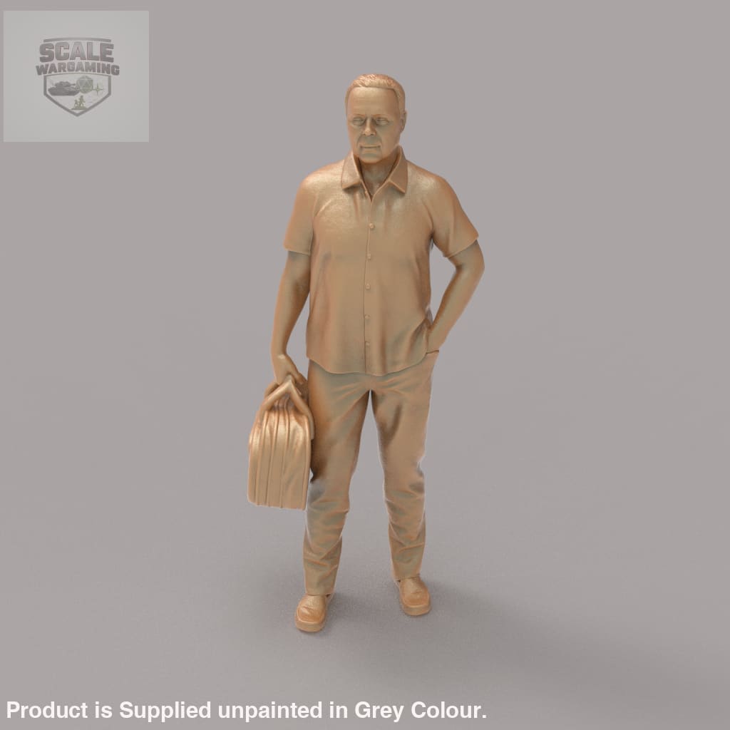 MM2094 Man With Bag waiting for a Train Figure
