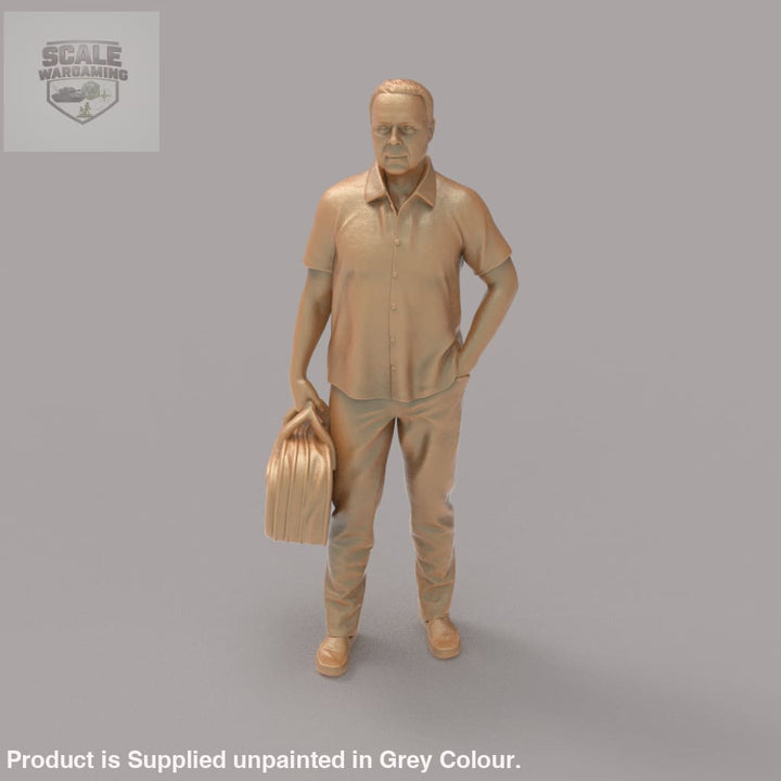 MM2094 Man With Bag waiting for a Train Figure