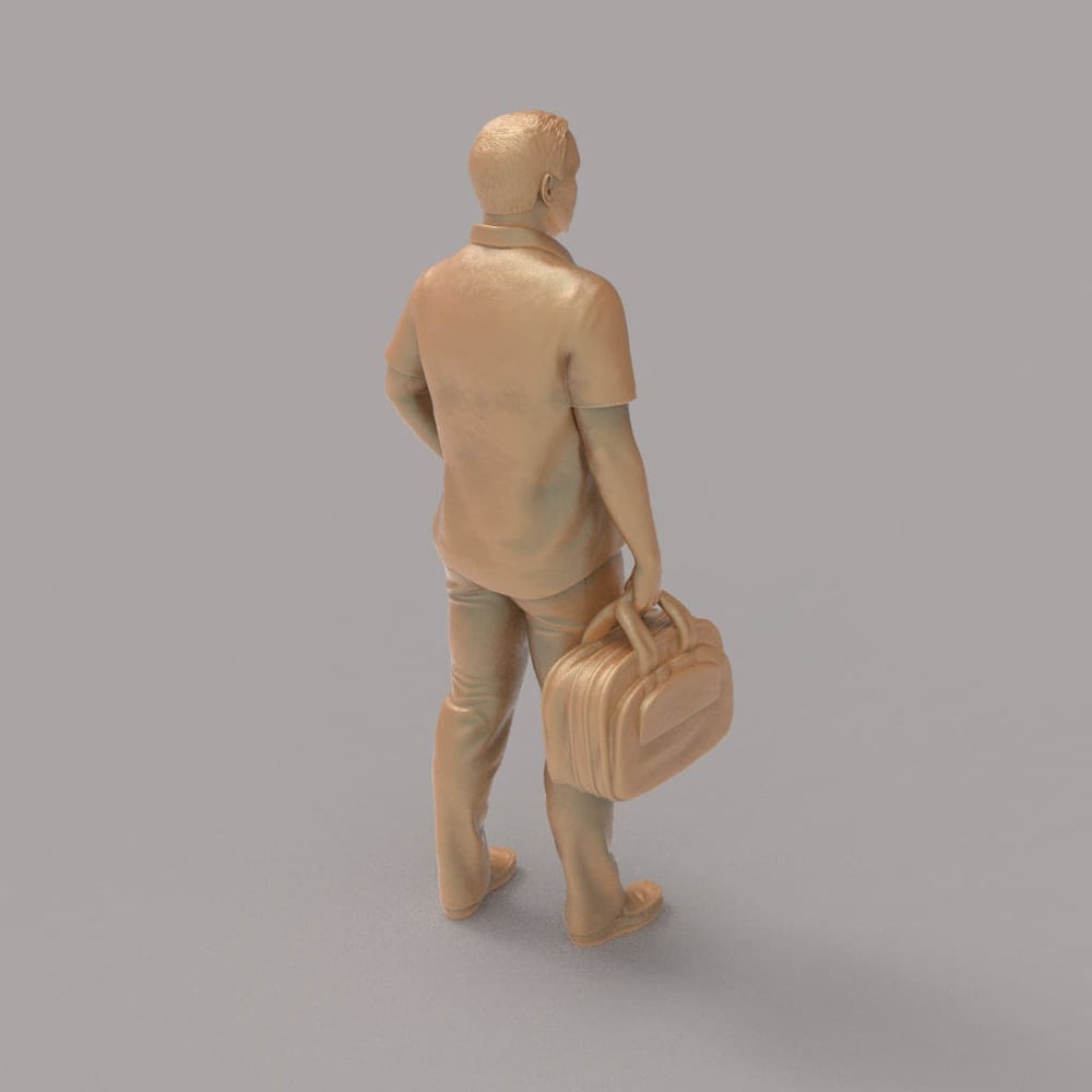 MM2094 Man With Bag waiting for a Train Figure