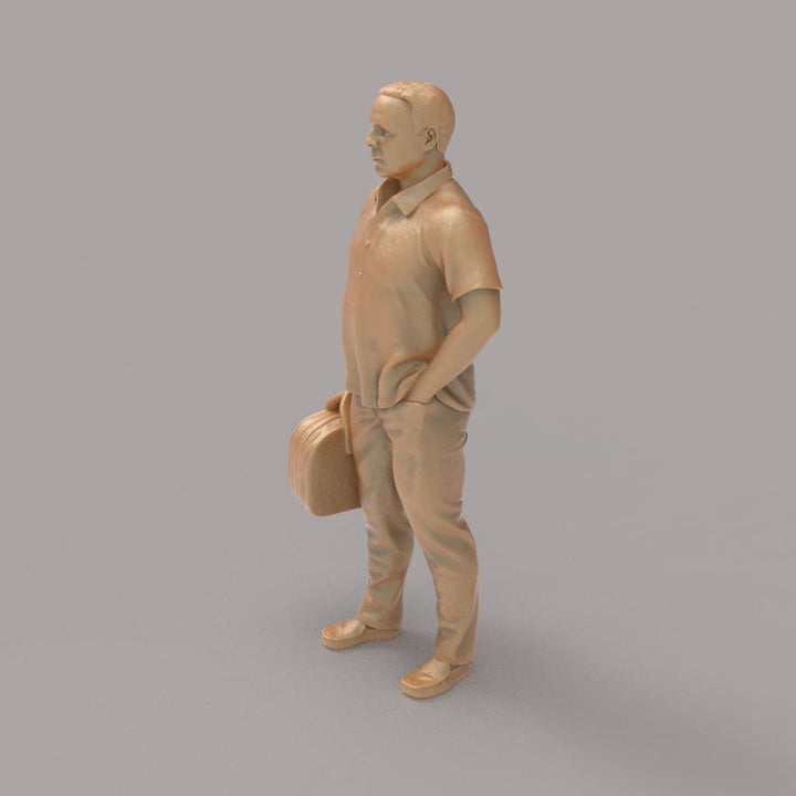MM2094 Man With Bag waiting for a Train Figure