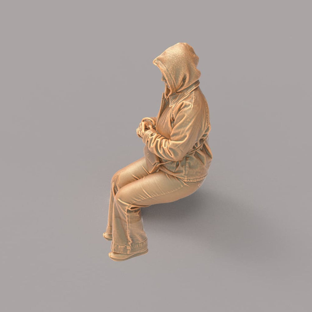 MM4163 Girl sitting in winter jacket Figure