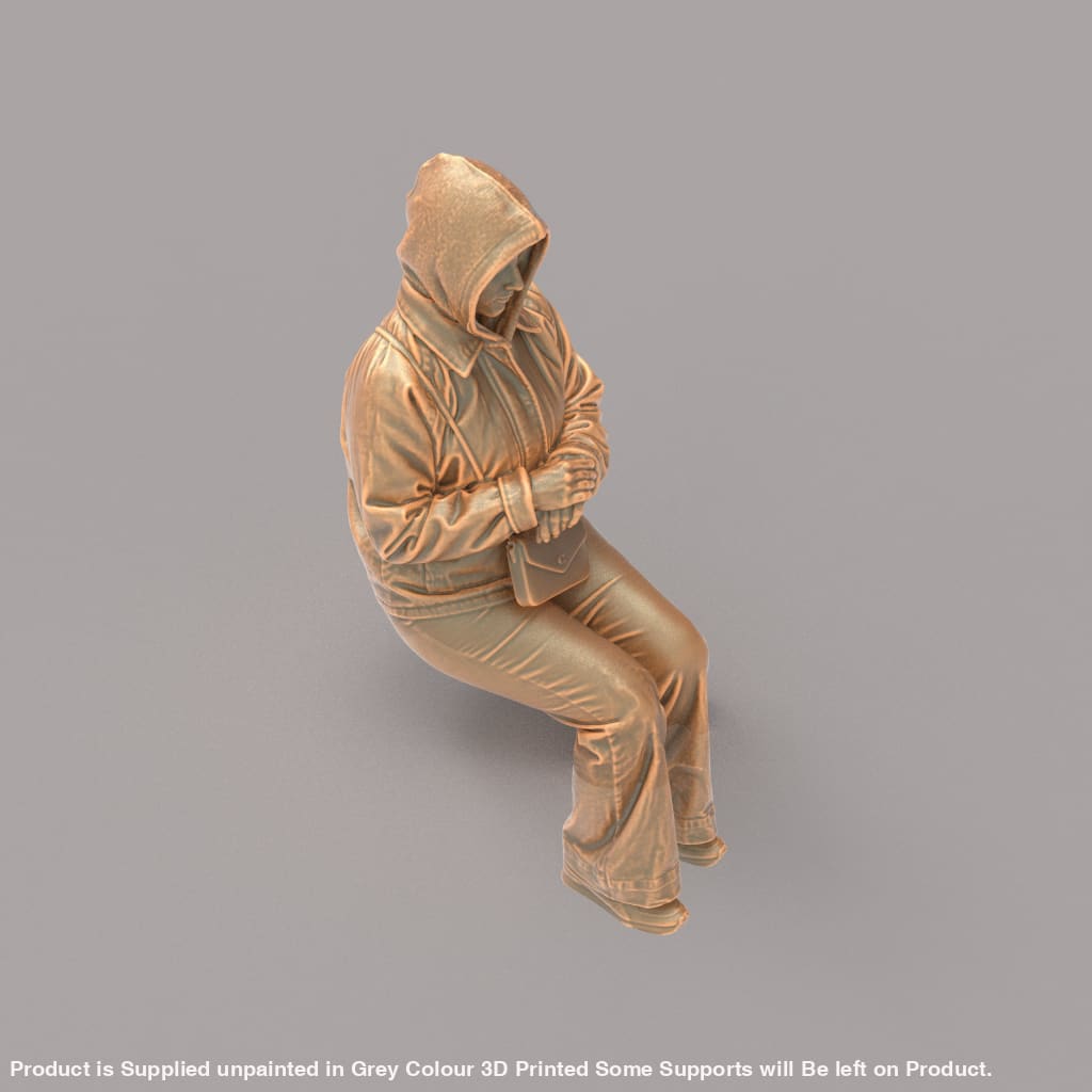MM4163 Girl sitting in winter jacket Figure