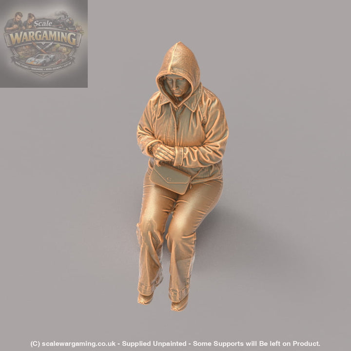 MM4163 Girl sitting in winter jacket Figure